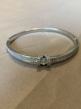 Silvertone bangle bracelet, rhinestones